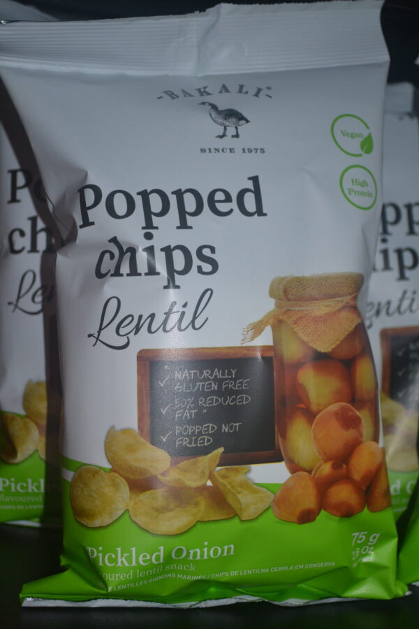 Variety of popped lentil chips in six different flavours, showcasing gluten-free, 50% reduced fat chips popped to crunchy perfection